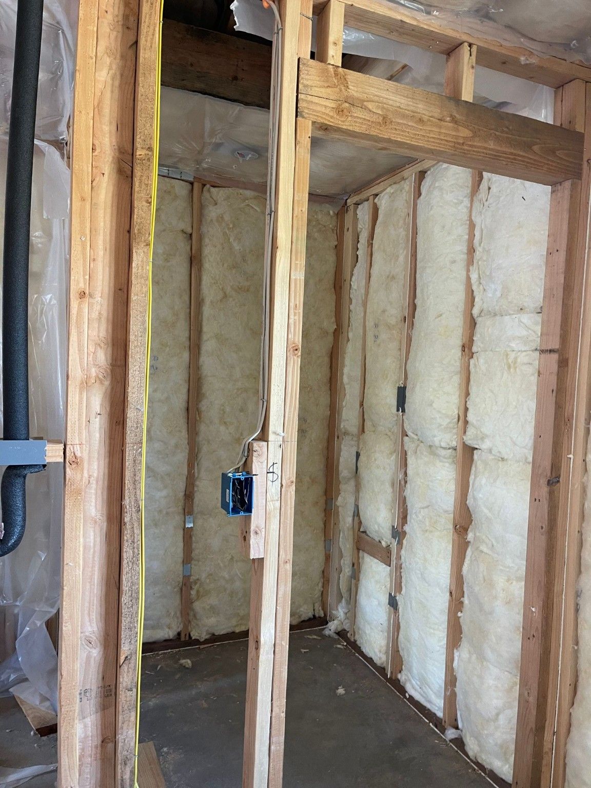 Insulated wall cavities and exposed wood partitions