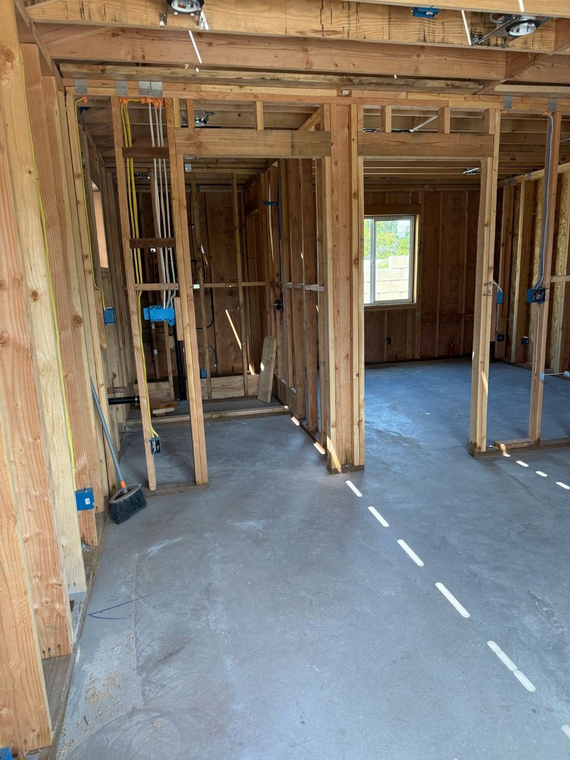Interior wood framing outlining rooms and doorways