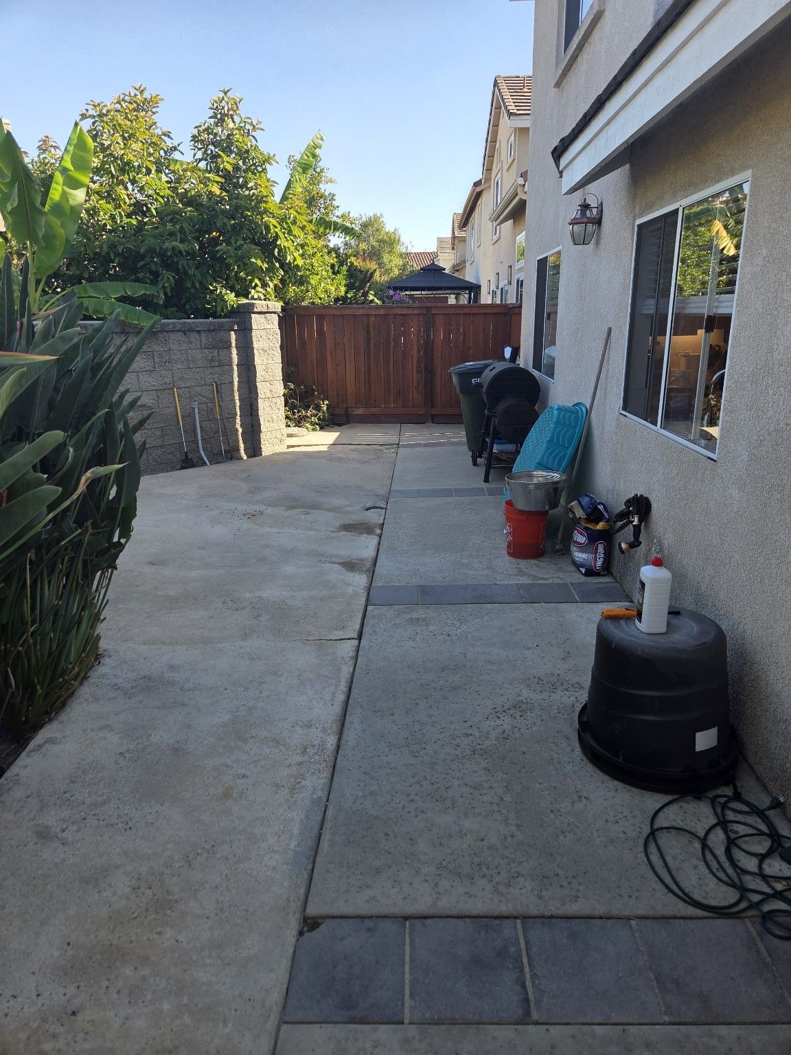 Original concrete patio beside the house